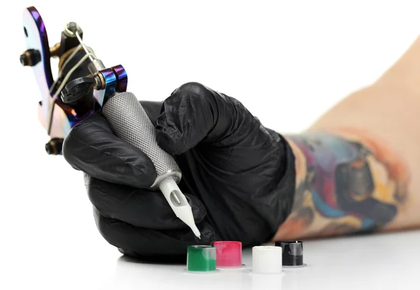 Художник татуировки с татуировки — стоковое фото