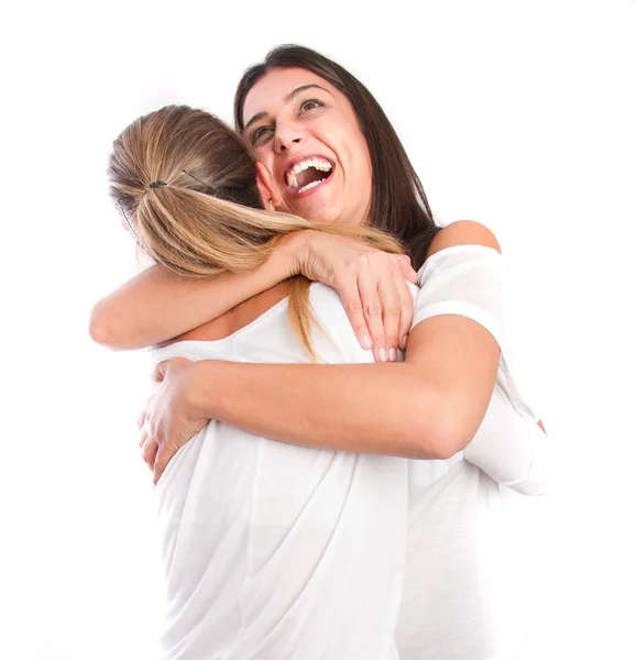 Две девочки, обнимающие — стоковое фото