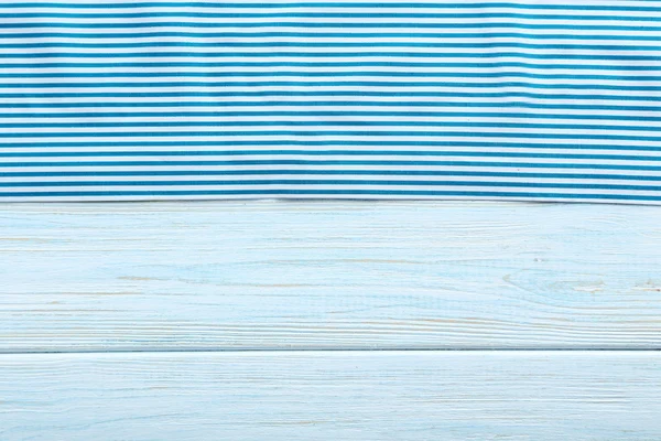 Деревянный стол салфетки — стоковое фото