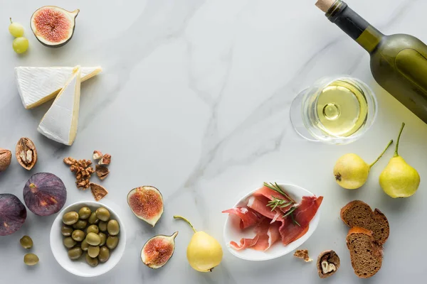 Flat Lay Wine Brie Cheese Jamon Figs Assorted White Marble — стоковое фото
