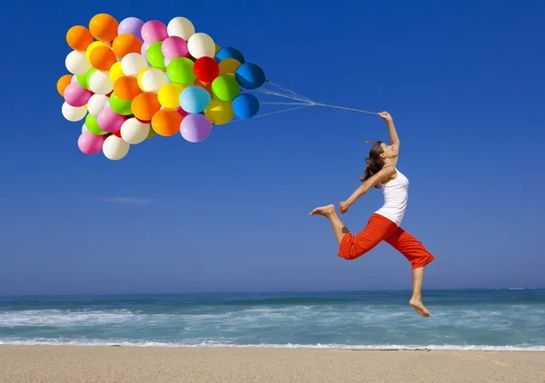 Скачок с воздушными шарами — стоковое фото