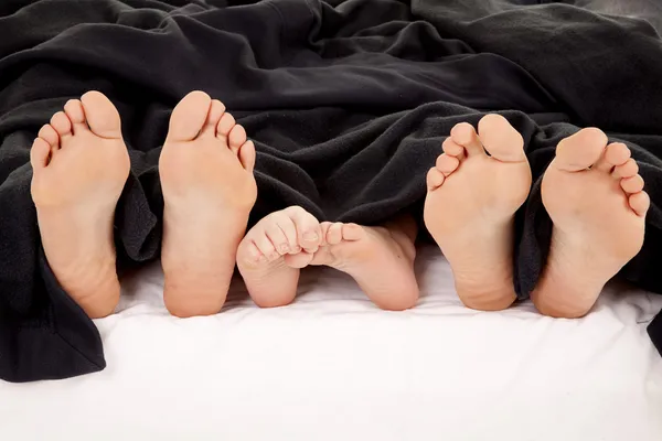 Семейные ноги — стоковое фото