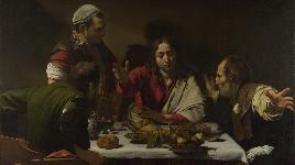 Автор - Караваджо. Изображен момент, когда воскресший Иисус пребывает в г. Эммаус, встречает 2 своих учеников и преломляет с ними хлеб.