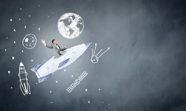 Бизнесмен, летать на Рисованные ракета — стоковое фото