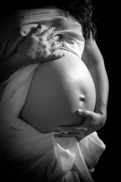 Живот беременной женщины — стоковое фото