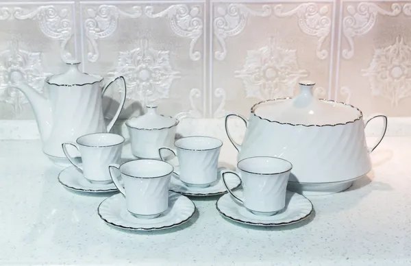 Чашки чая с чайником — стоковое фото