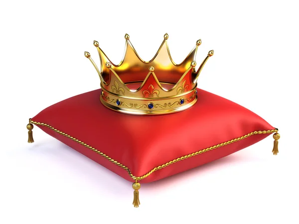 Золотая Корона на красной подушке — стоковое фото