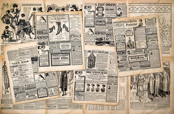 Газетные страницы с античной рекламы — стоковое фото