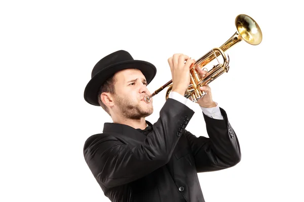 Человек в шляпе играет труба — стоковое фото