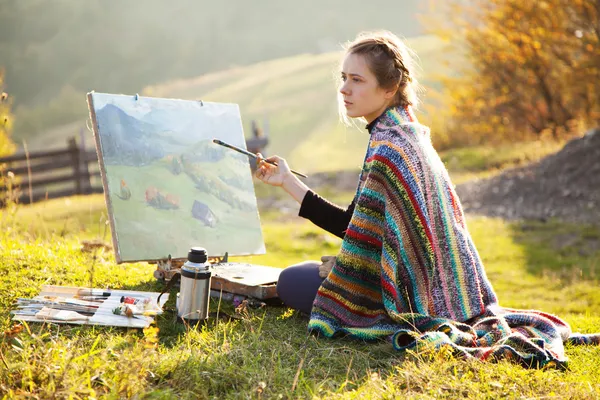 Молодой художник живопись пейзаж Стоковое Изображение
