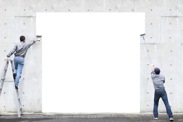 Два рабочих картина пустое место на стене — стоковое фото