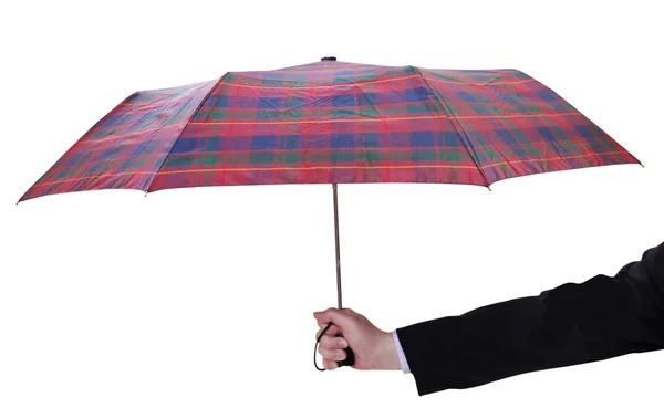 Мужская рука с открытым клетчатый зонтик Лицензионные Стоковые Фото