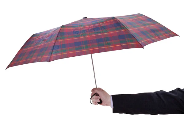 Человек проводя открытые клетчатый зонтик Стоковая Картинка