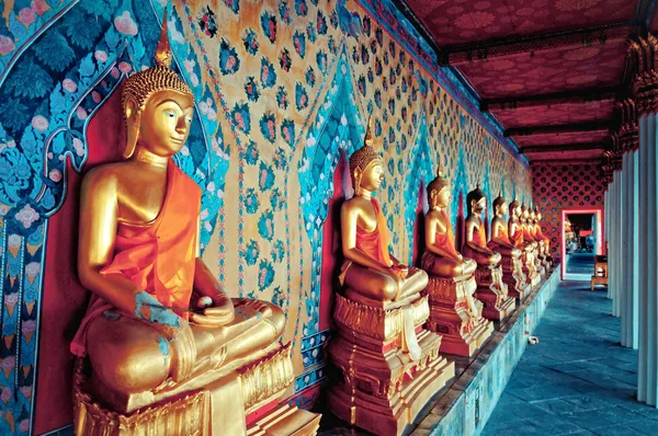 Глоденом статуи Будды в храме Ват Арун, Бангкок Стоковое Фото