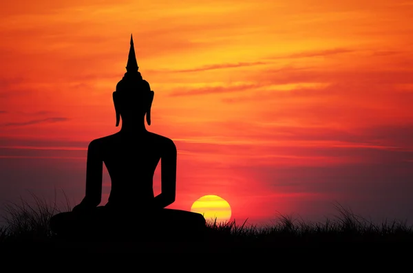 Будда на закате Стоковое Фото