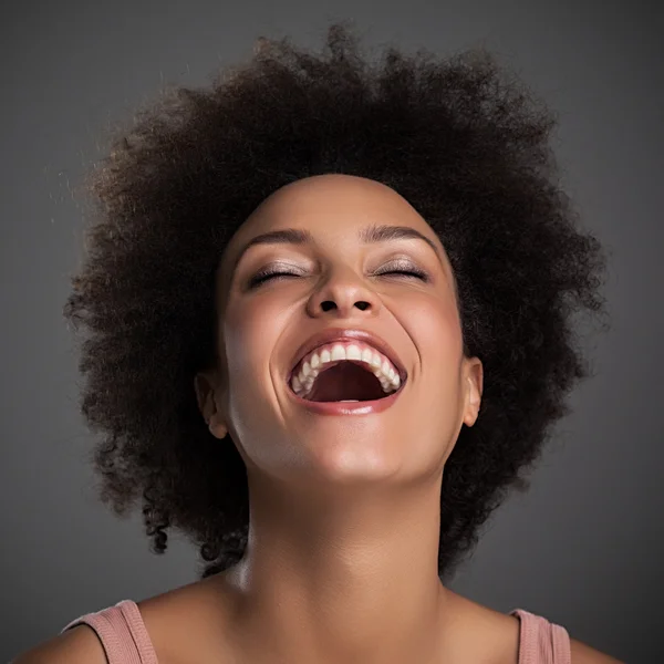 Африканская женщина, смеющаяся Лицензионные Стоковые Фото