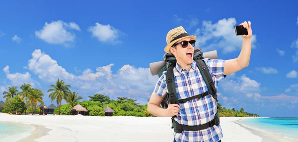 Селф принимая туристов на пляже Лицензионные Стоковые Изображения