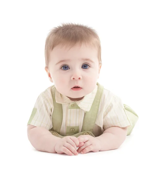 Портрет очаровательны голубые глаза ребенка лежа — стоковое фото