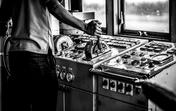 Captain's hands at a ferry steering wheel close-up. Black-white photo. — стоковое фото