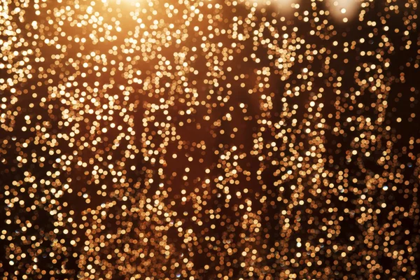 Блестите праздничный фон рождественских огней. свет и золото defo — стоковое фото