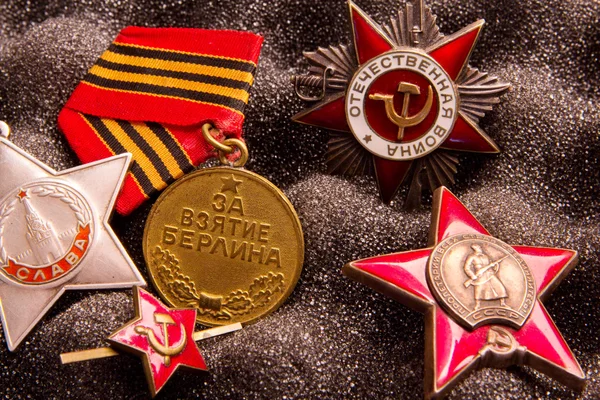 Set of Vintage Soviet military medal and orders (the Fame, for the capture of Berlin, patriotic war, Proletarians of all countries, unite USSR) — стоковое фото