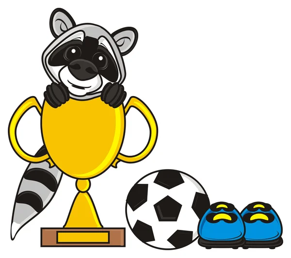 Енот сидит в Золотой Кубок рядом с мячом и футбола сапоги — стоковое фото