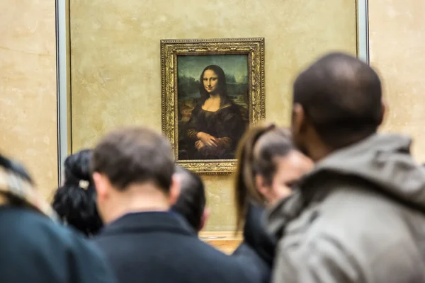 Visitors take photo of "Mona Lisa" Стоковая Картинка