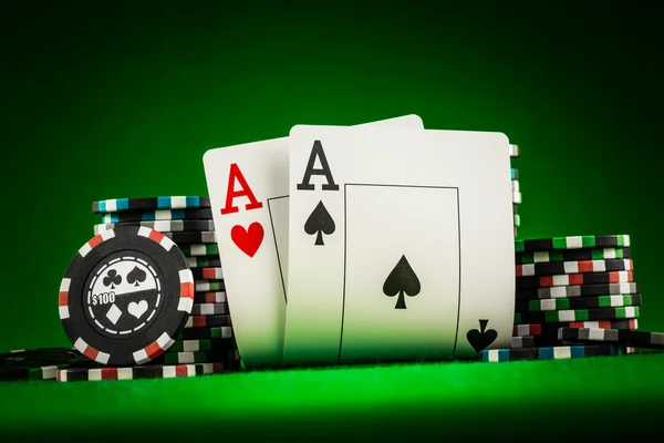 depositphotos_61546303-stock-photo-chips-and-two-aces.jpg