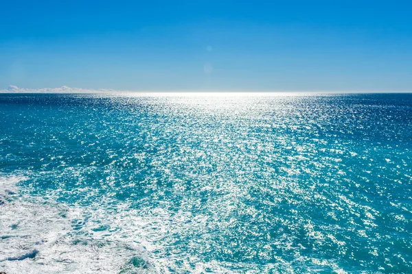 View of beautiful Mediterranean landscape, sea and sunny sky. Лицензионные Стоковые Изображения