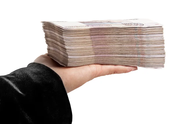 Стек бумажных денег на женщин в руке — стоковое фото