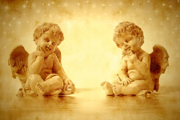 Две милые Ангелы сидя — стоковое фото