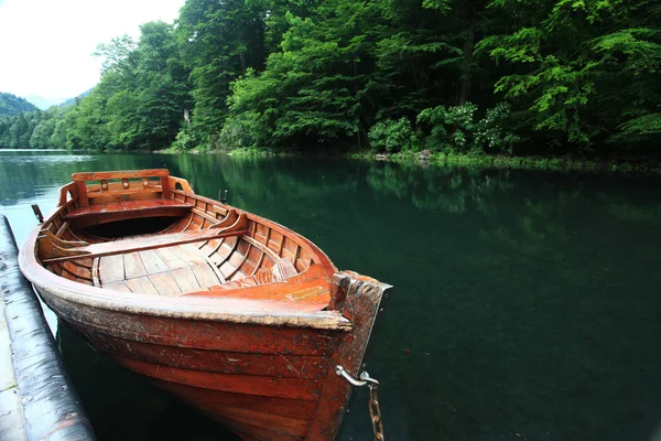 Деревянные лодки на озере Стоковое Изображение