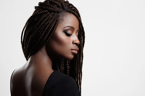 Черная женщина с косами Стоковая Картинка