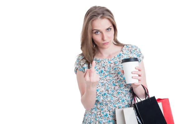 Rebel shopper doing obscene gesture with middle finger Стоковое Изображение