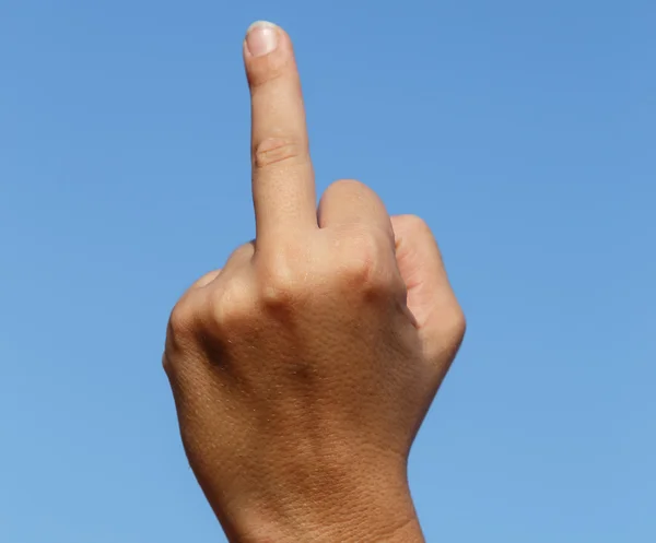 Средний палец, оскорбление знак Лицензионные Стоковые Изображения