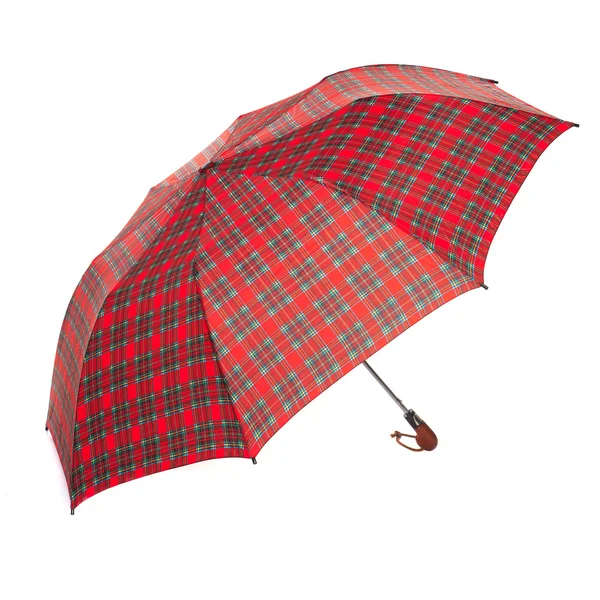 The checkered umbrella isolated against white background Стоковое Изображение