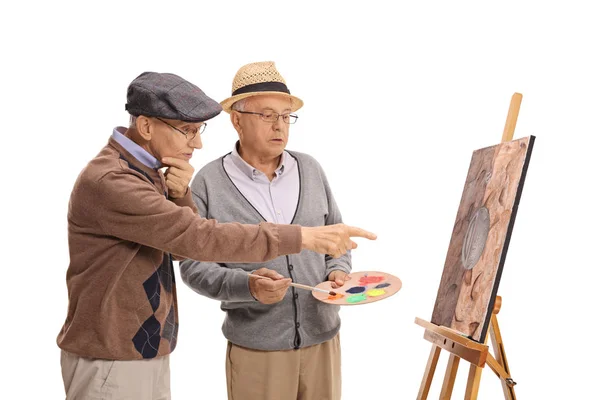 Две Пожилые Мужчины Глядя Картину Говорить Изолированные Белом Фоне — стоковое фото