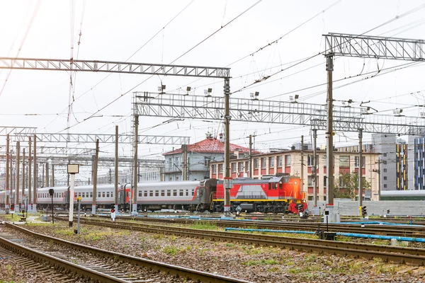 Train with railcars rzd on rails Стоковое Изображение