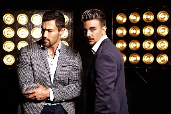 Two handsome men in elegant suits — стоковое фото