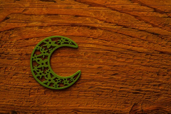 Зеленая Луна Полумесяца на деревянной доске — стоковое фото