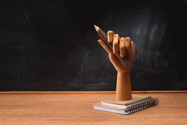 Close View Textbooks Wooden Hand Holding Pencil Desk Front Chalkboard — стоковое фото