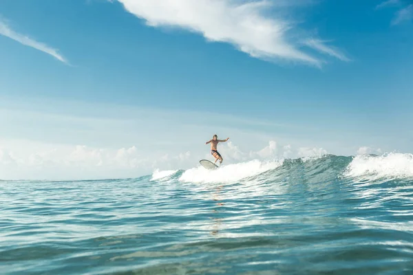 Distant View Male Surfer Riding Waves Ocean Nusa Dua Beach — стоковое фото