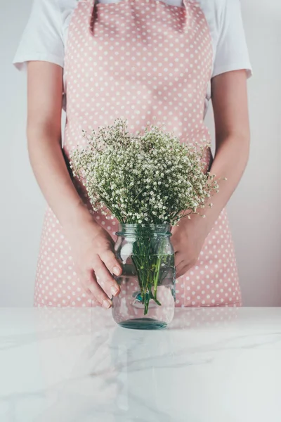 Cropped Image Woman Holding Jar White Flowers Kitchen — стоковое фото