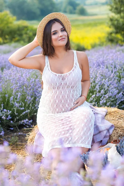 Beautiful Pregnant Woman White Dress Touching Belly Straw Hat Violet — стоковое фото