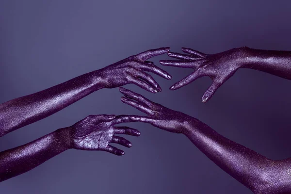 Cropped View Girls Hands Glitter Touching Each Other Isolated Purple — стоковое фото