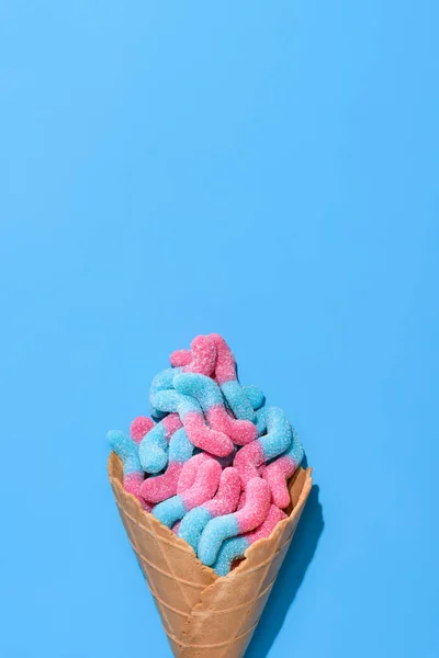 Top View Sweet Gummy Worms Waffle Cone Blue Стоковое Фото