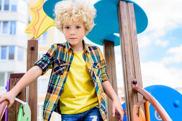 Low Angle View Adorable Curly Little Boy Having Fun Playground Стоковое Фото