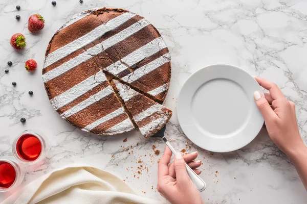 Partial Top View Person Putting Piece Delicious Homemade Cake Plate Лицензионные Стоковые Фото