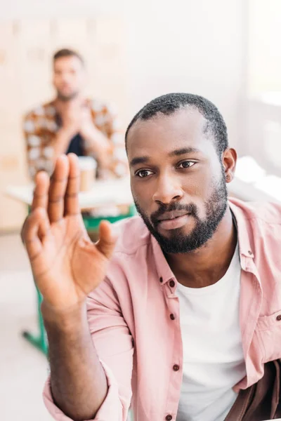 Close Portrait Young African American Student Raising Hand Answer Teacher Стоковое Фото