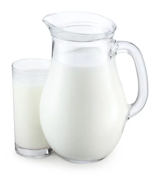 Питчер и стекло молока — стоковое фото